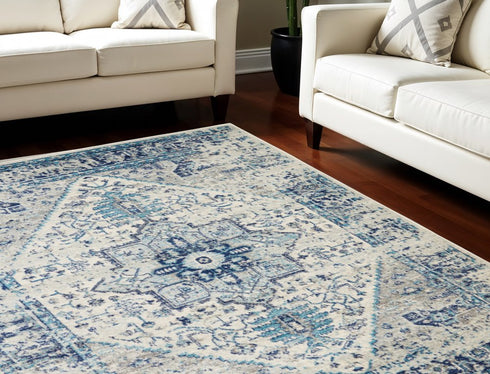 5' X 7' Ivory And Light Blue Floral Medallion Distressed Area Rug